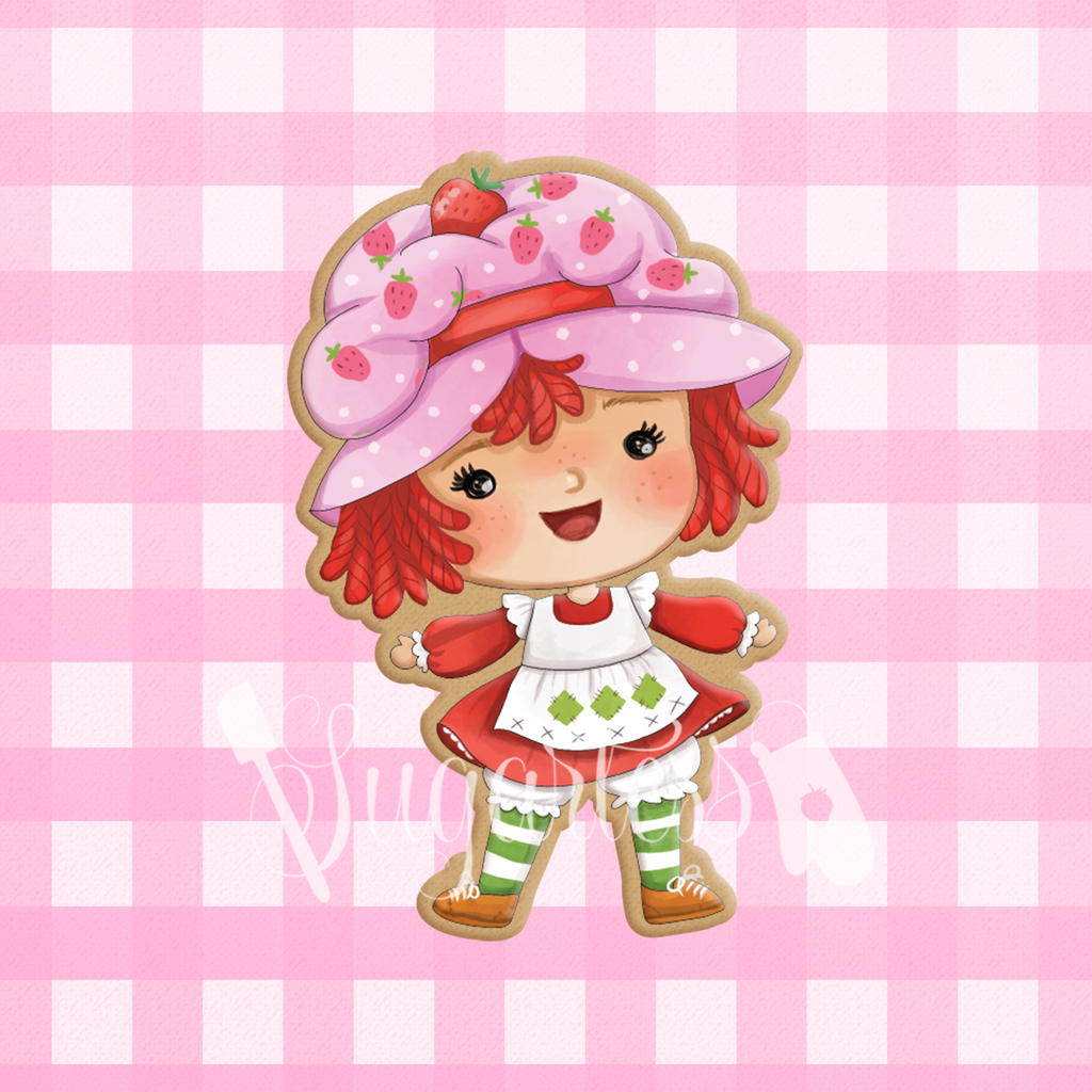 Sugartess cookie cutter in shape of Strawberry Shortcake cartoon girl character.