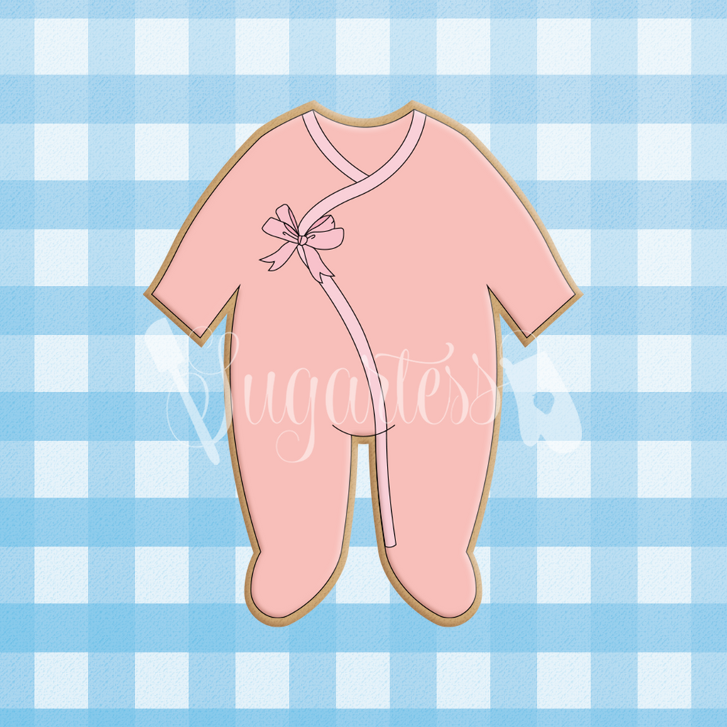 Sugartess custom cookie cutter in shape of baby footed onesie pajamas.