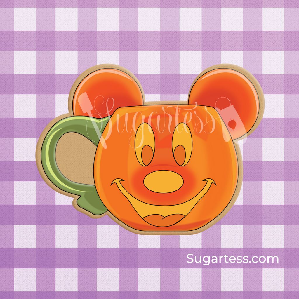 Sugartess custom cookie cutter in shape of cartoon boy mouse pumpkin head Halloween mug.