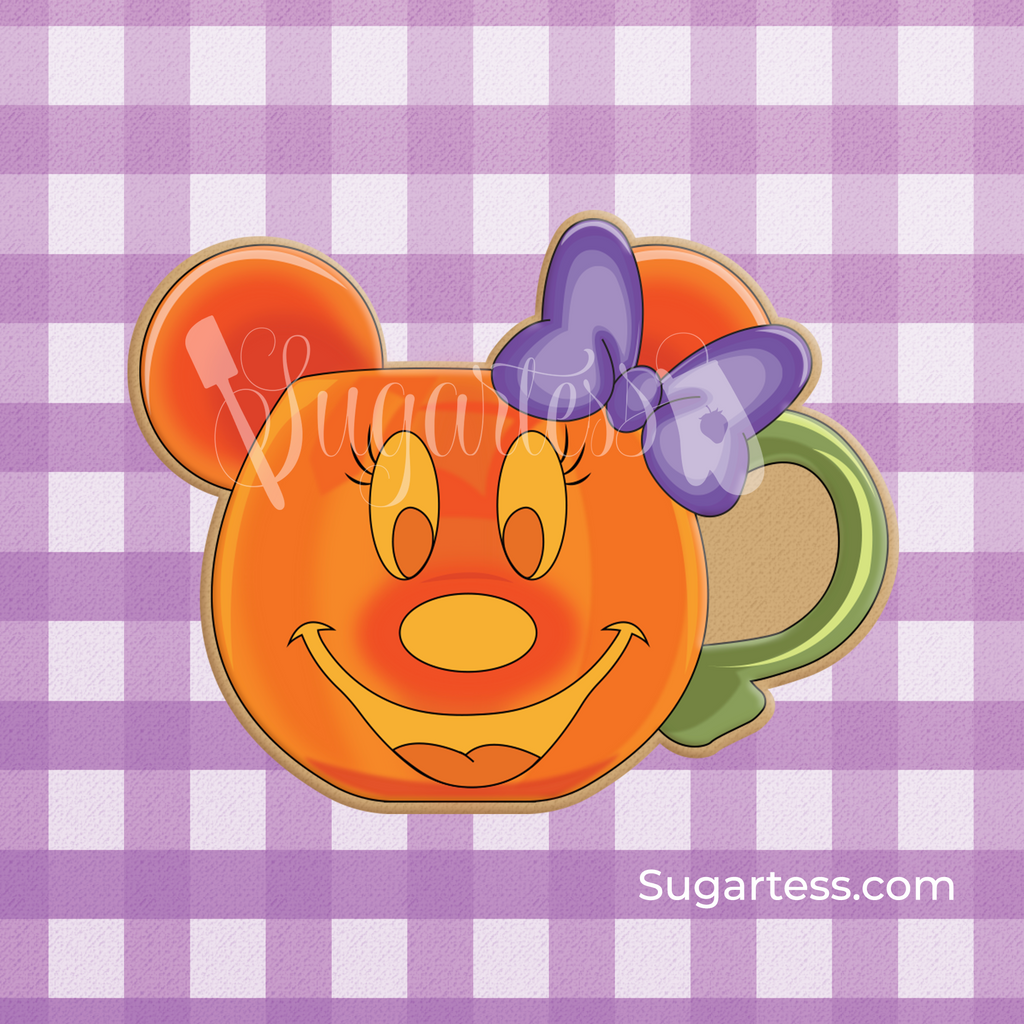Sugartess custom cookie cutter in shape of cartoon girl mouse pumpkin head Halloween mug.