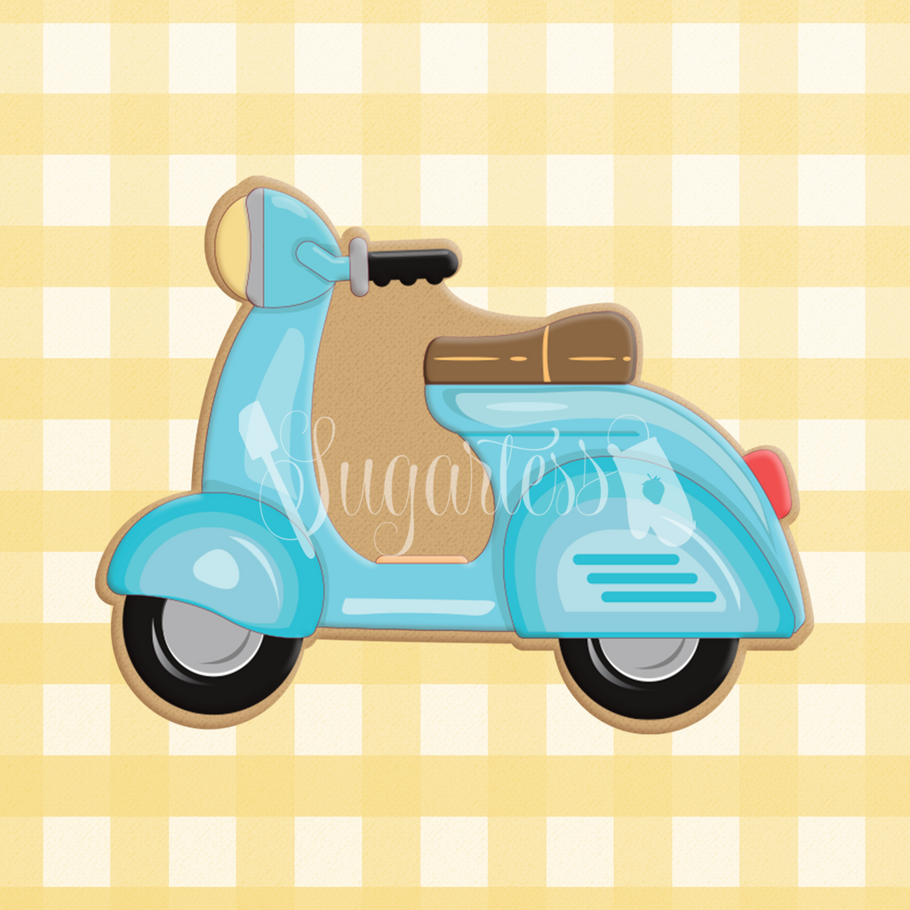 Sugartess custom cookie cutter in shape of a light blue motor vespa scooter, side view.