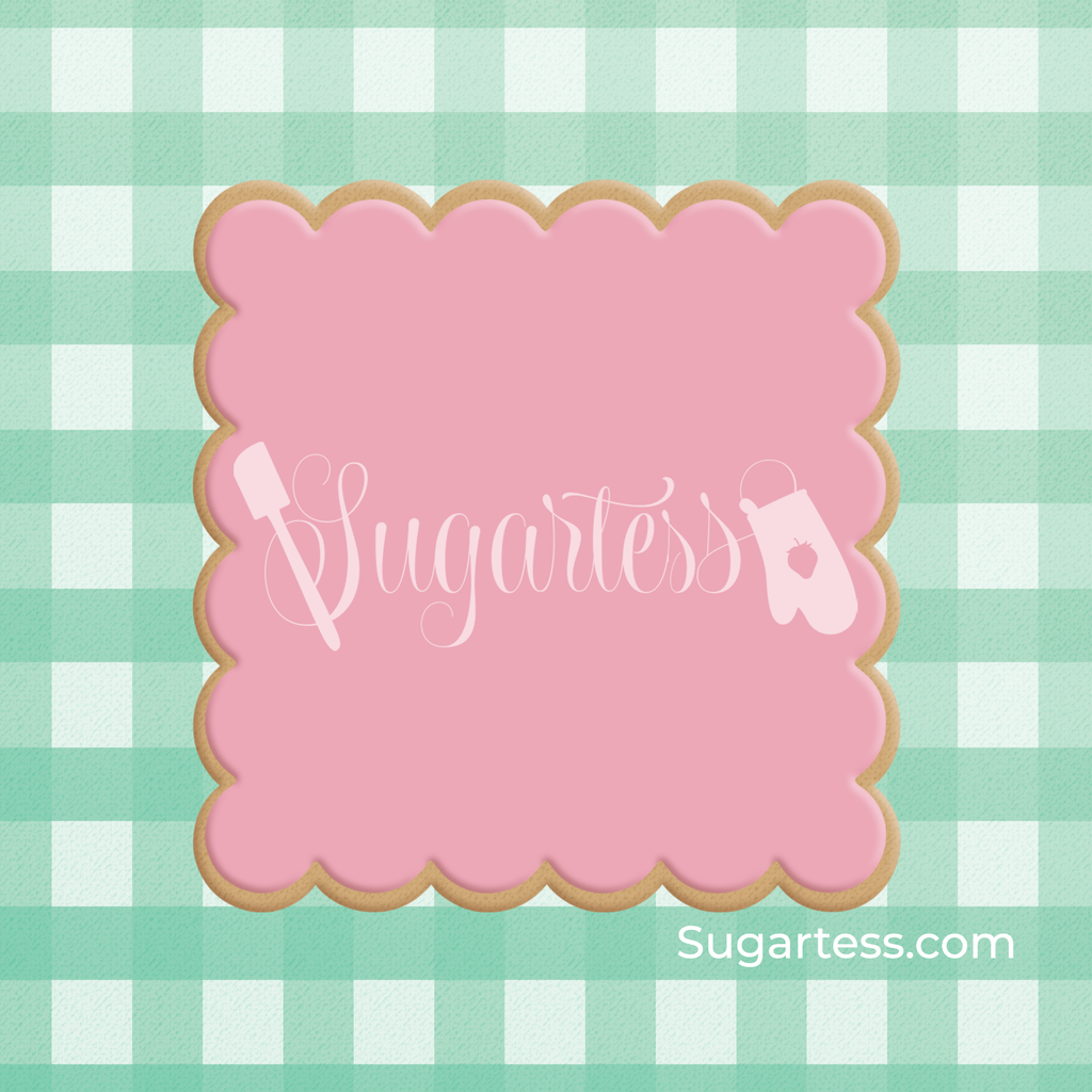 Sugartess custom cookie cutter in shape of a scalloped squared plaque frame.