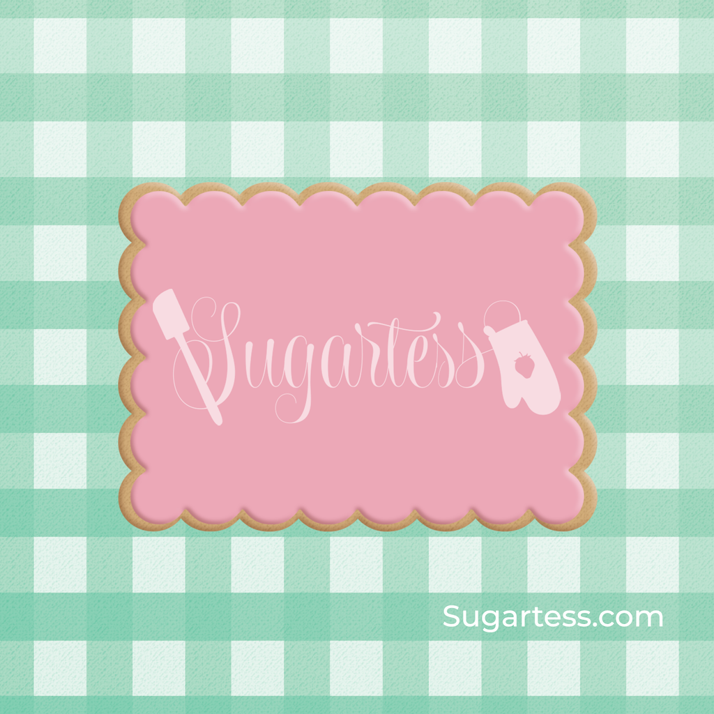 Sugartess custom cookie cutter in shape of a scalloped rectangular plaque frame.