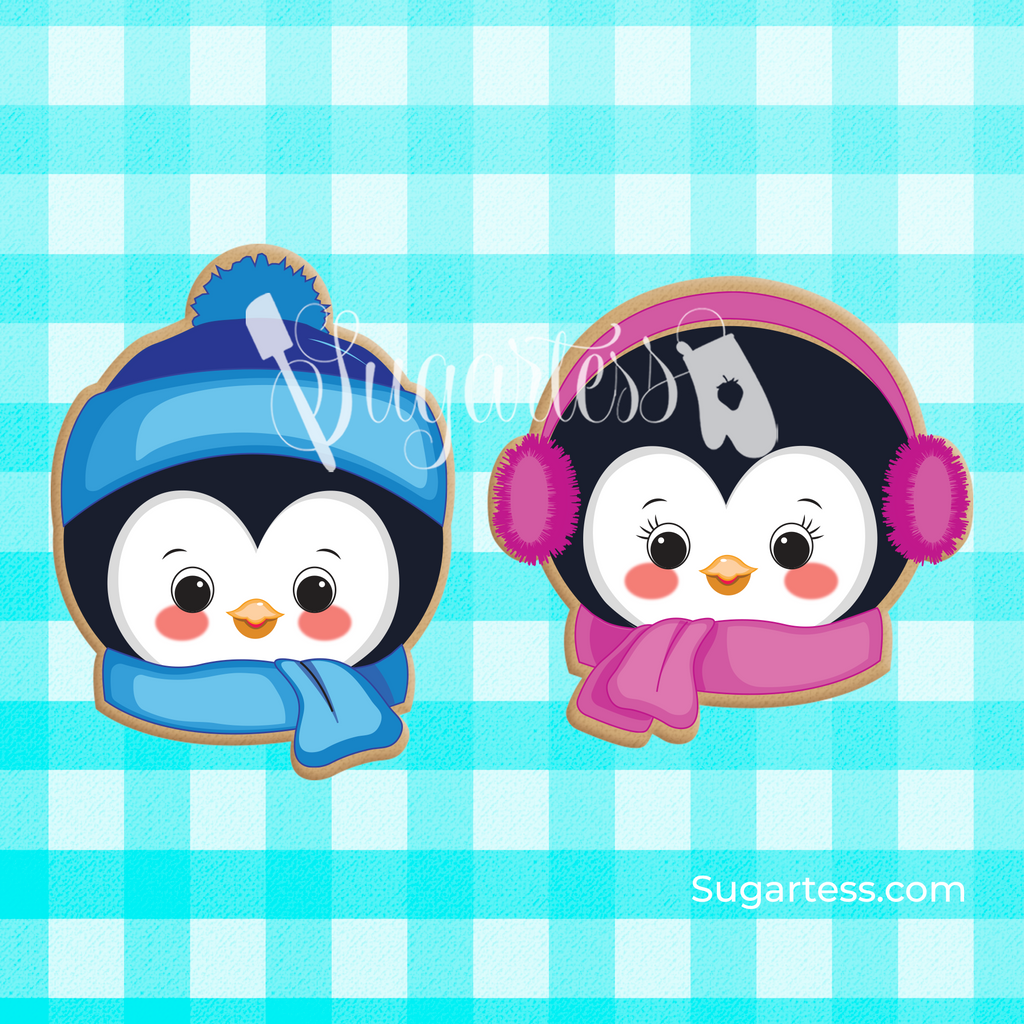 Sugartess custom cookie cutter set of 2 winter penguin heads. The boy is wearing a inter hat and the girl is wearing ear muffs.