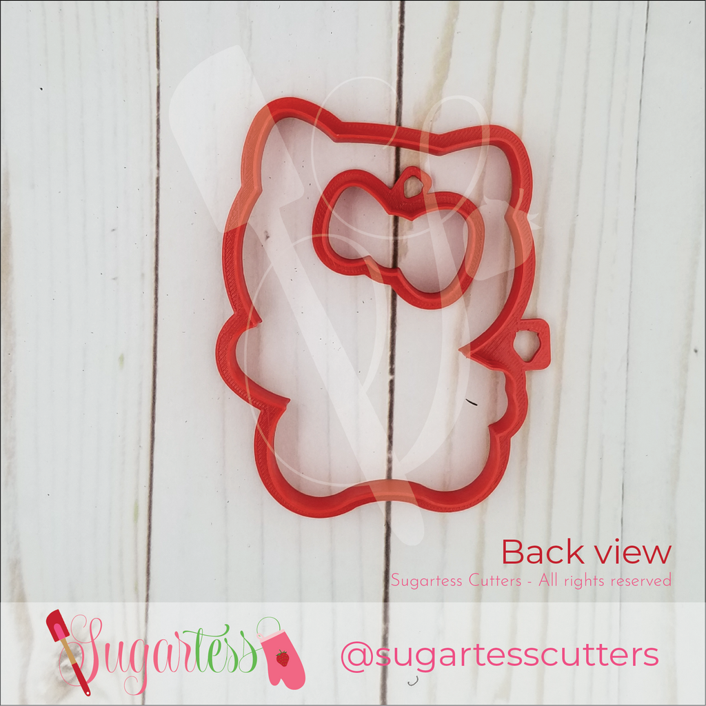 Sugartess custom cookie cutter set of kitty character and head bow.