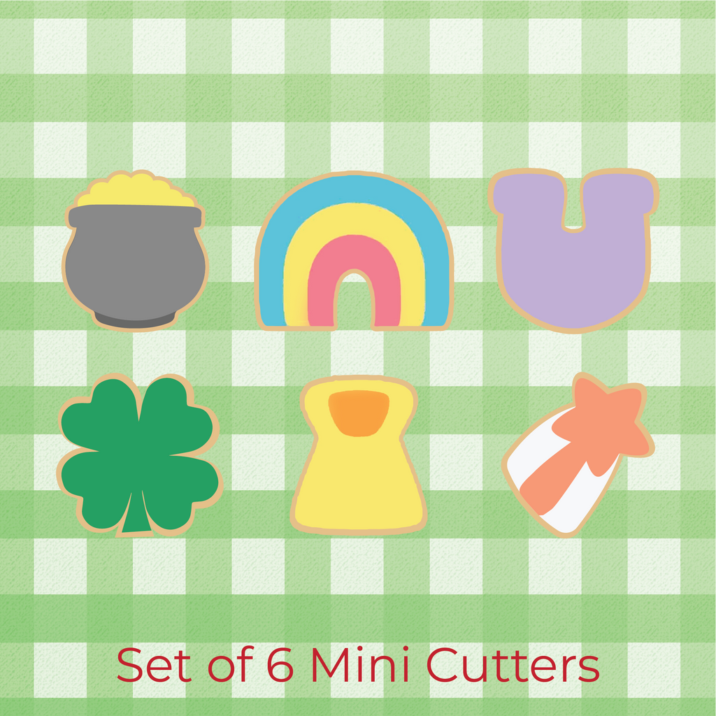 Sugartess custom cookie cutter set in shape of 6 lucky charms: pot of gold, rainbow, horseshoe, shamrock, shooting star, rune.