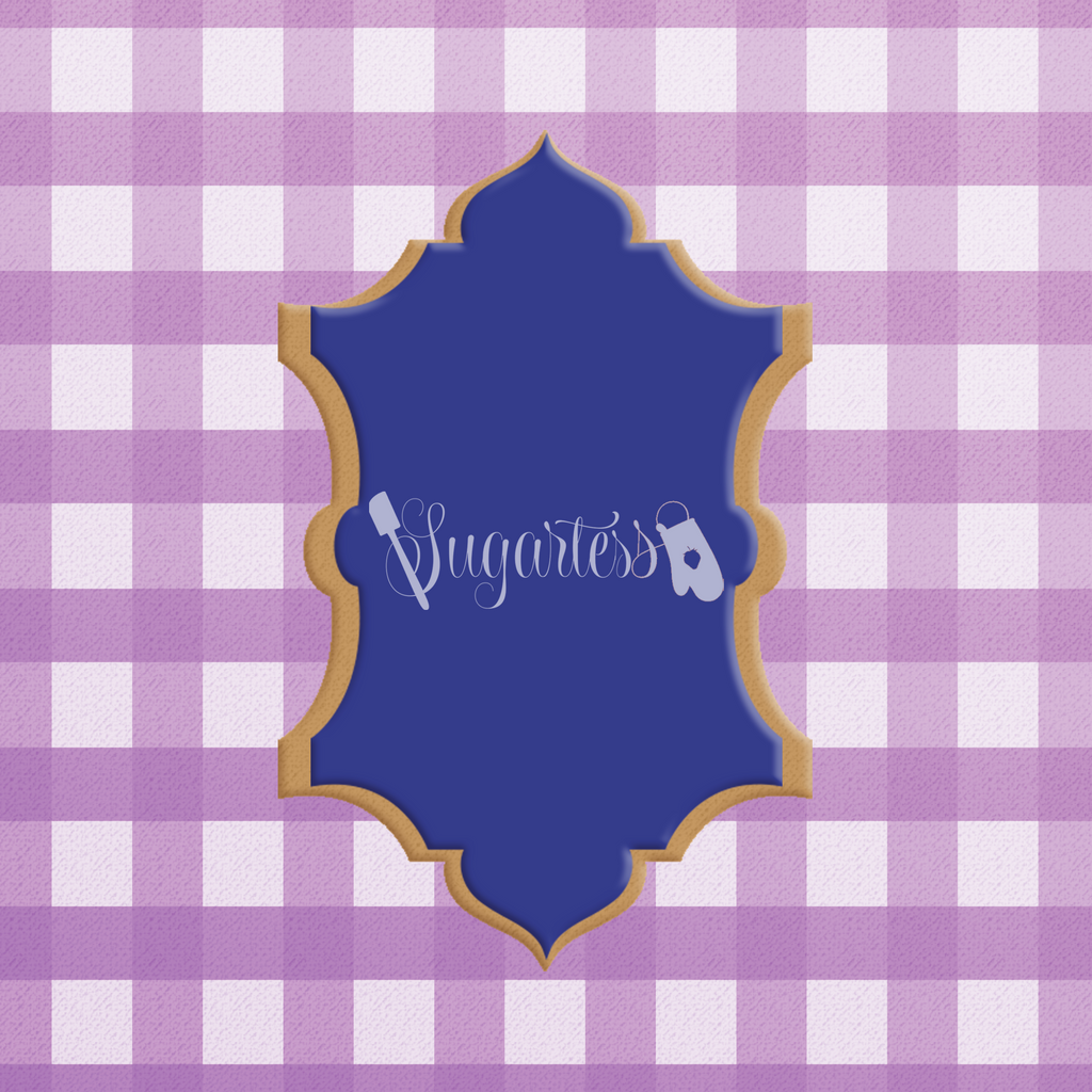 Sugartess custom cookie cutter in shape of ornate Arabian plaque frame.