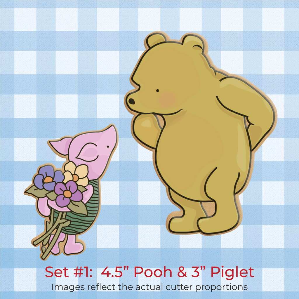 Sugartess cookie cutter set of classic Winnie The Pooh bear and Piglet. Piglet is holding a surprise flower bouquet and Pooh is looking down at him with wondering expression.