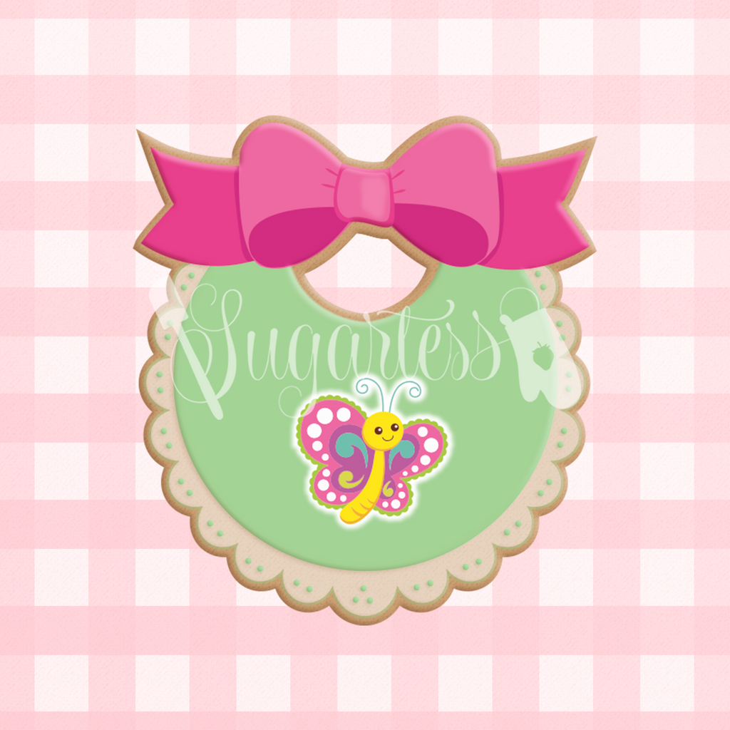 Sugratess custom cookie cutter in shape of round scalloped edge bib with bow.