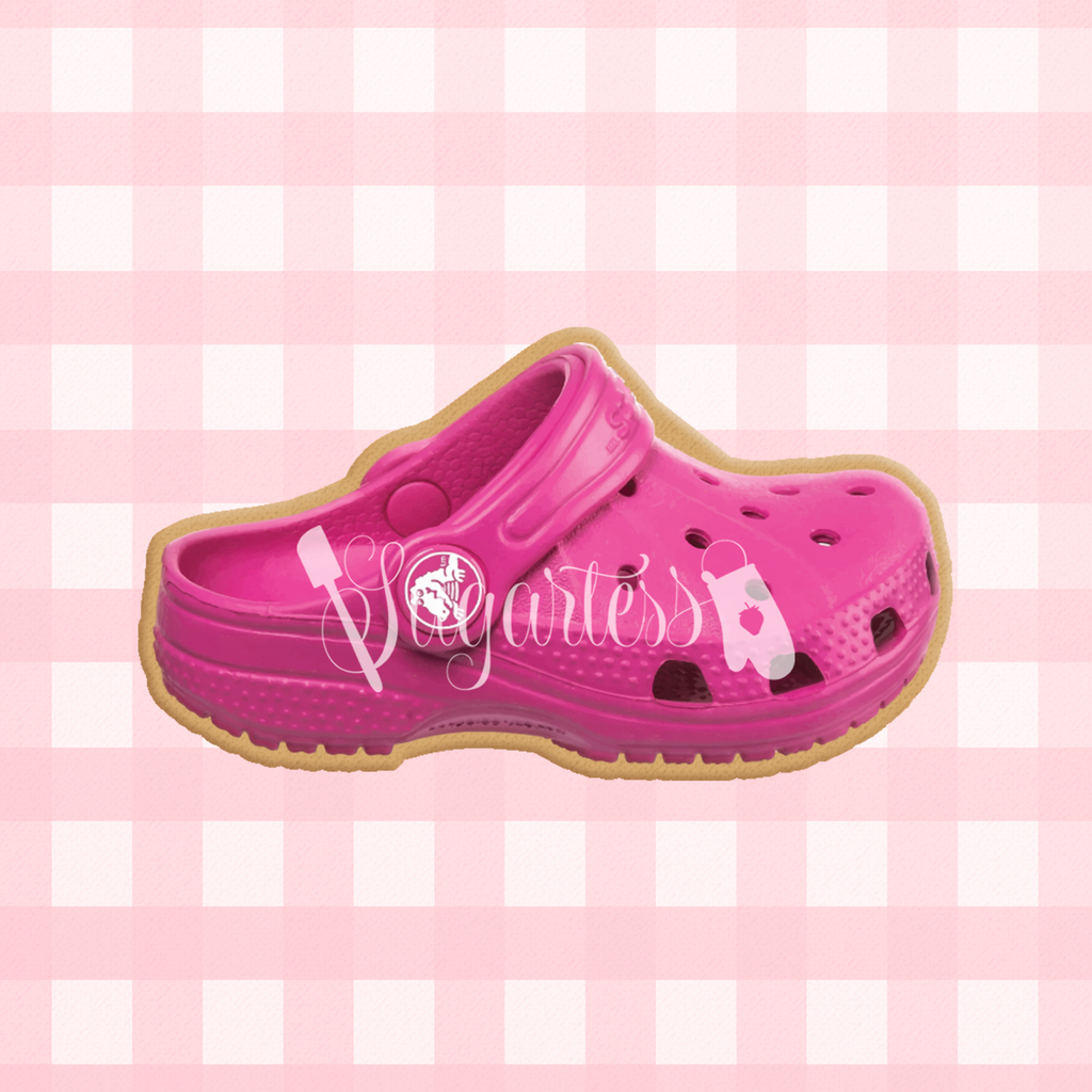 Sugartess custom cookie cutter in shape of pink toddler Croc shoe.