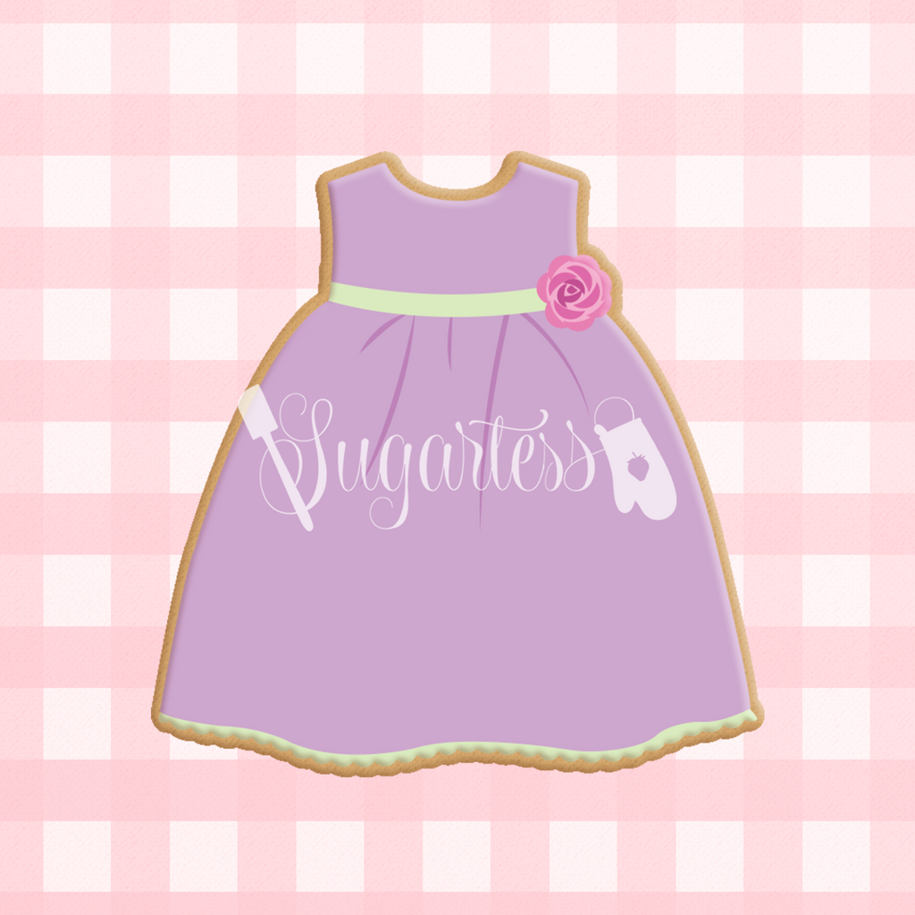 Sugartess custom cookie cutter in shape of baby girl dress.