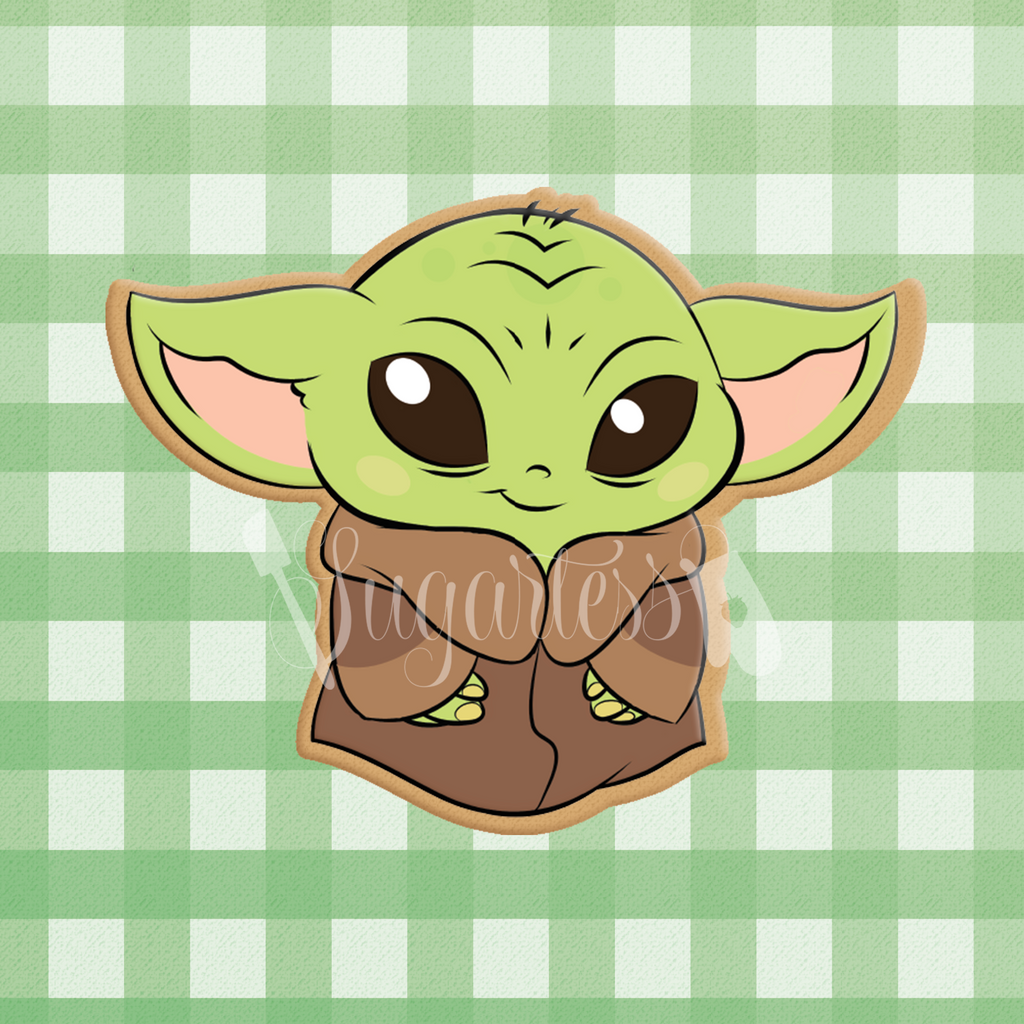 Sugartess custom cookie cutter in shape of standing Baby Yoda.