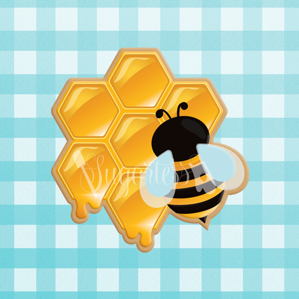 Sugartess custom cookie cutter in shape of dripping honeycomb with bumblebee on top.