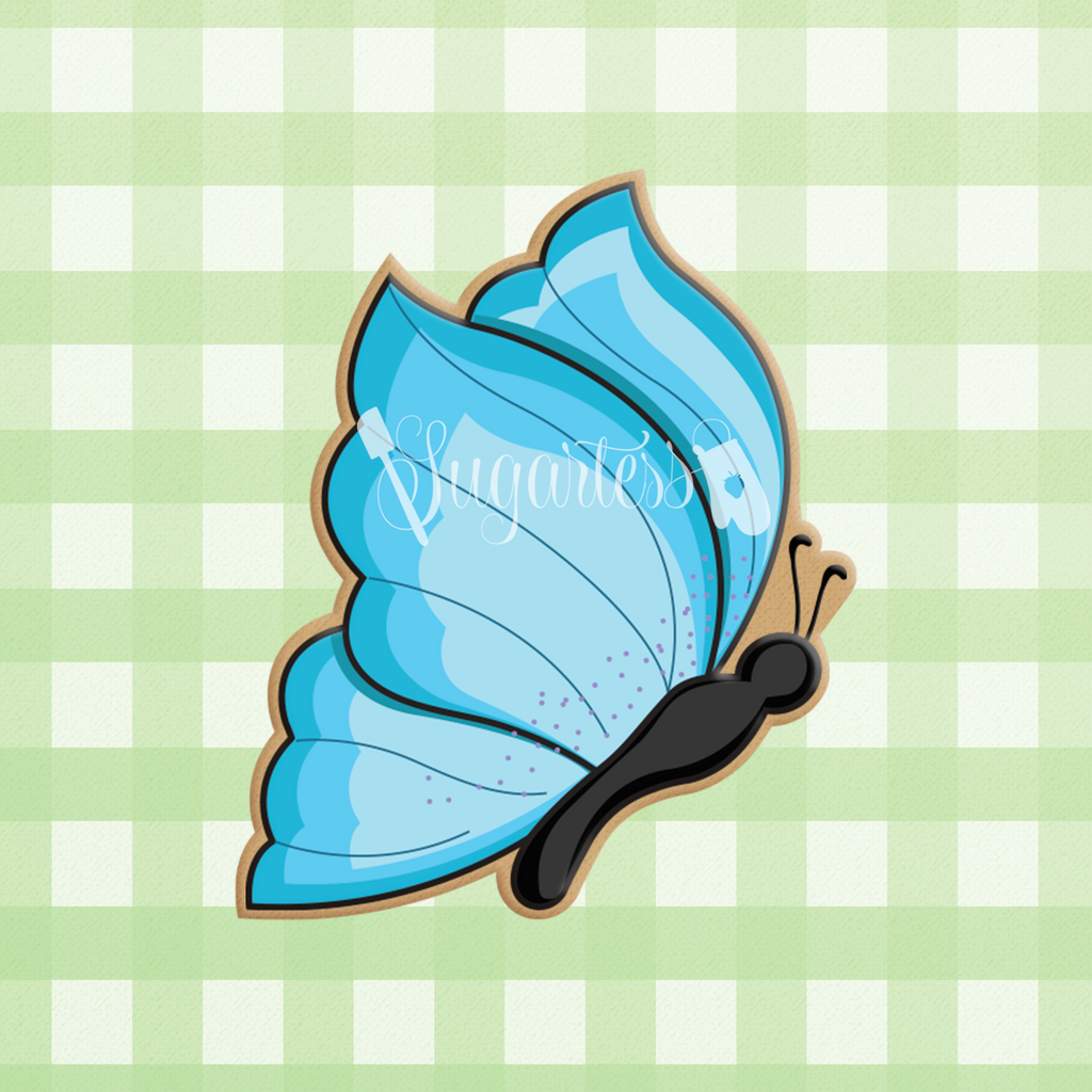 Sugartess custom cookie cutter in shape of the profile view of a blue butterfly.