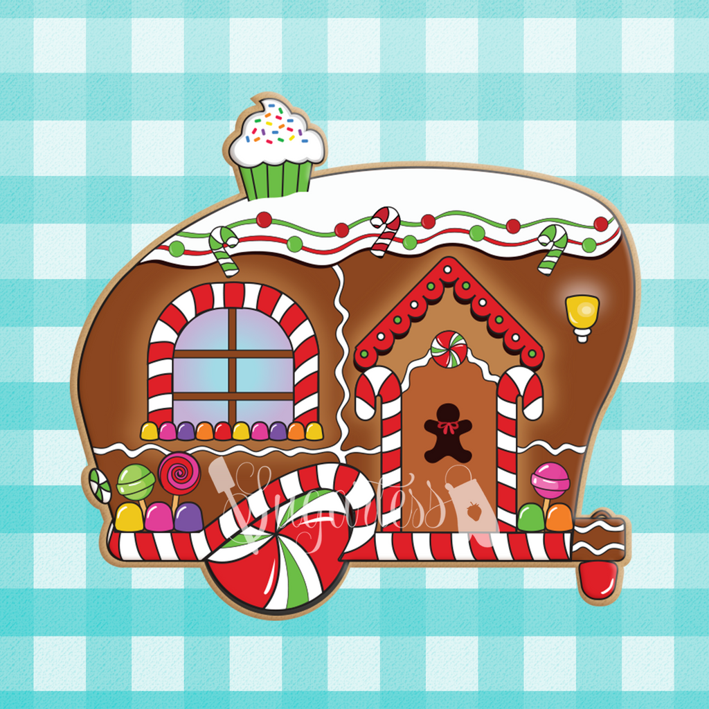 Sugartess custom holiday cookie cutter in shape of a gingerbread camper trailer house decorated with candy and a cupcake chimney on top.