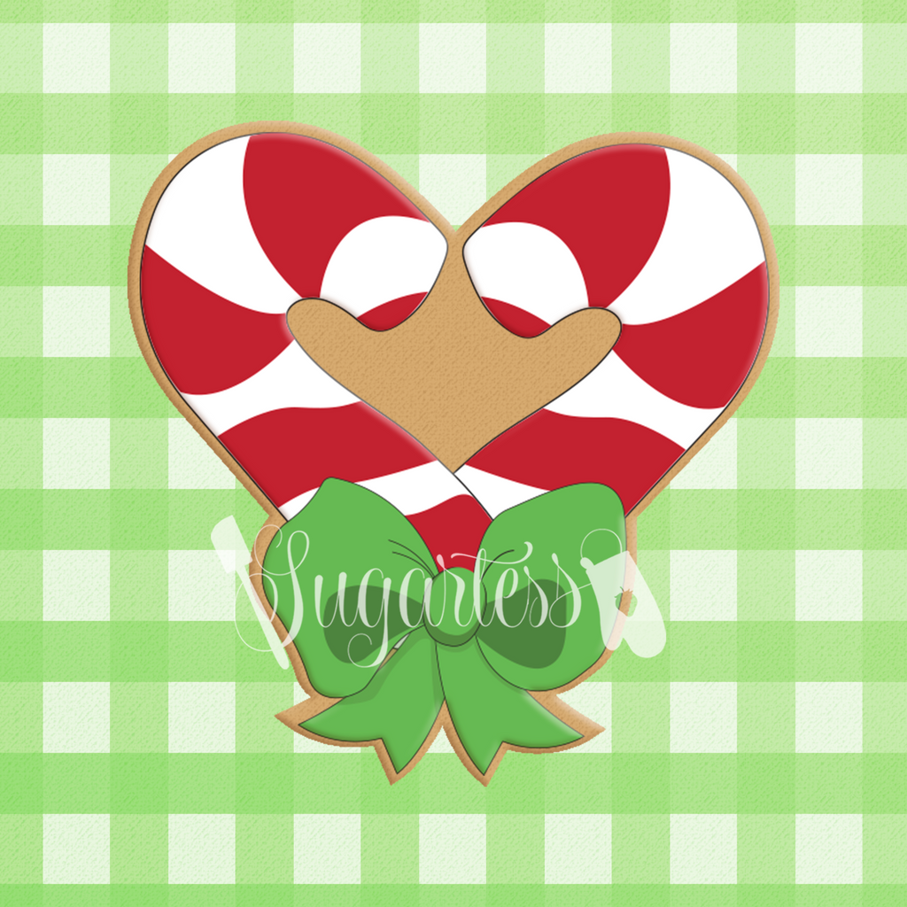 Sugartess custom cookie cutter in shape of a chubby candy cane heart with bow.
