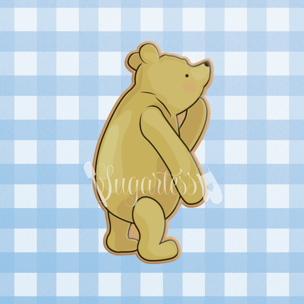 Sugartess custom cookie cutter in shape of classic Winnie The Pooh #2 standing thinking.