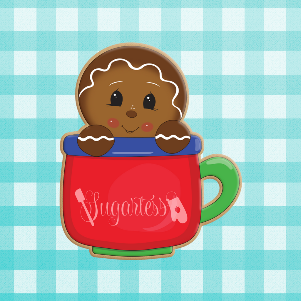 Sugartess custom holiday cookie cutter in shape of a gingerbread man peeking out of a mug.