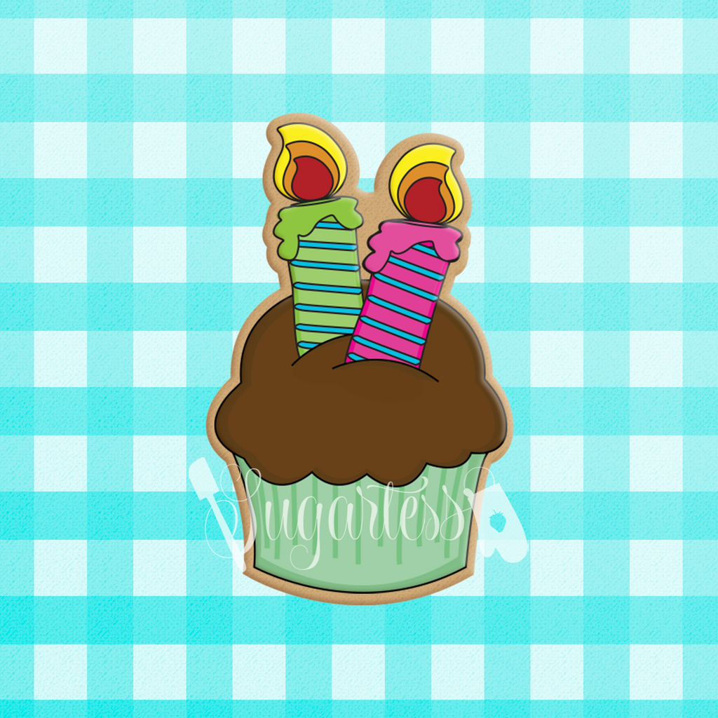Sugartess cookie cutter in shape of a second birthday cupcake with two candles on top.