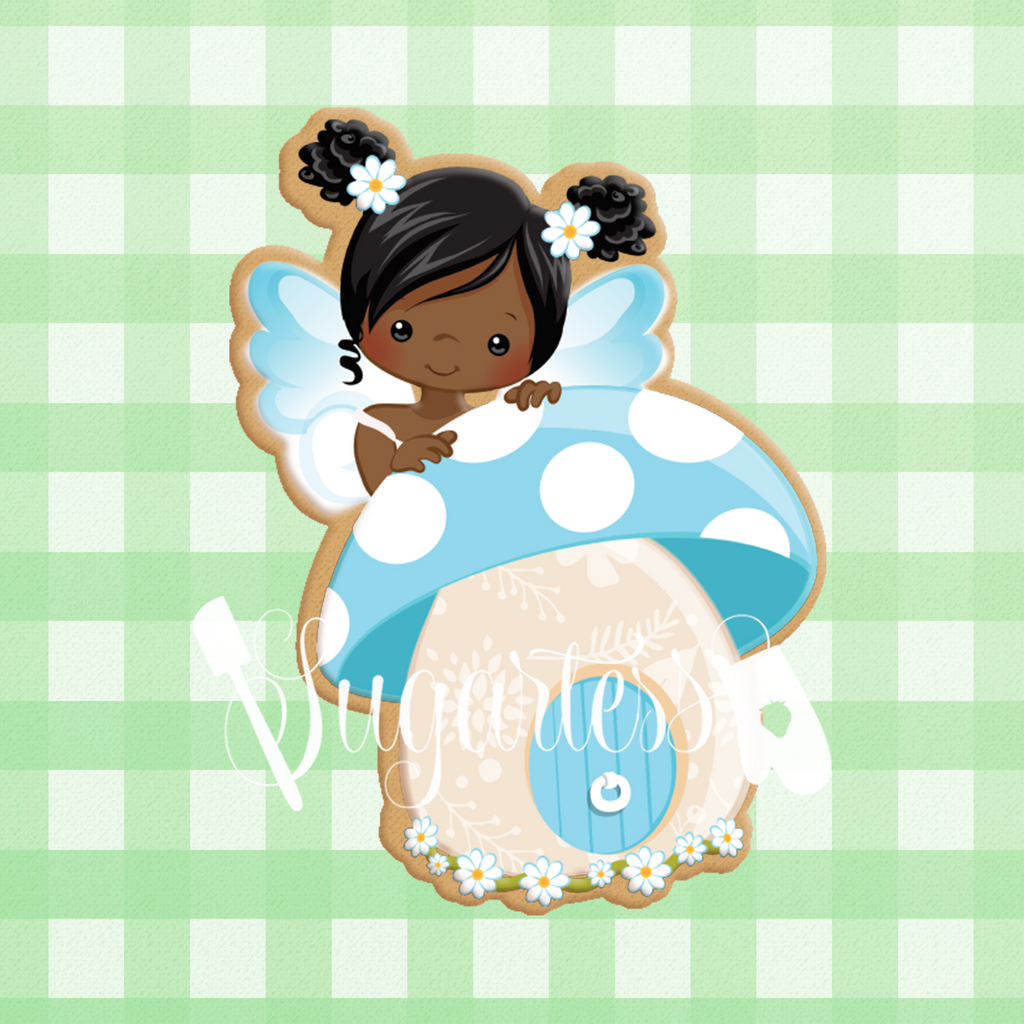 Sugartess custom cookie cutter in shape of blue fairy with mushroom house.