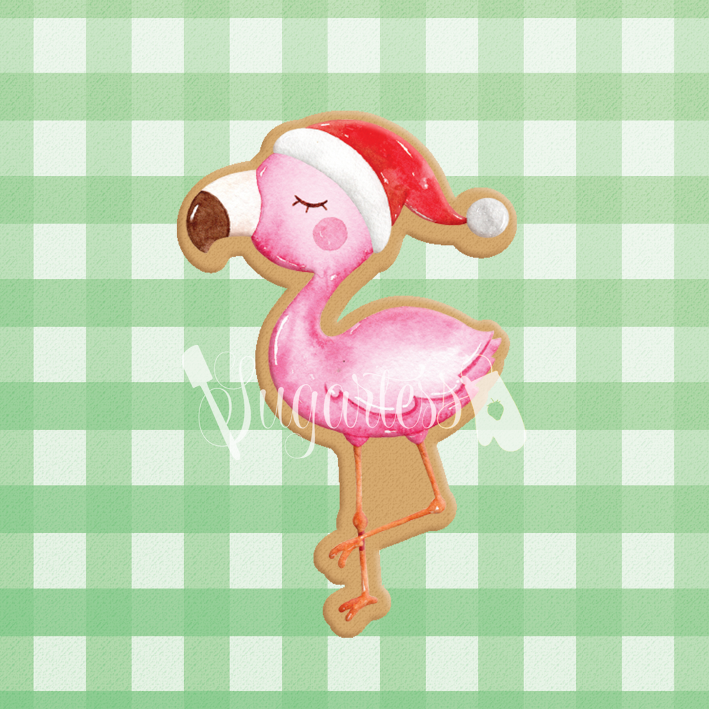 Sugartess custom cookie cutter in shape of holiday flamingo with Santa hat.