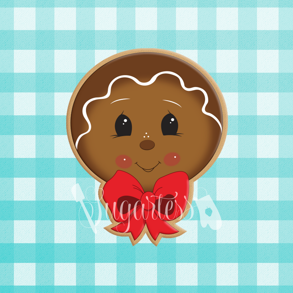 Sugartess custom cookie cutter in shape of a gingerbread man's head with bow tie.