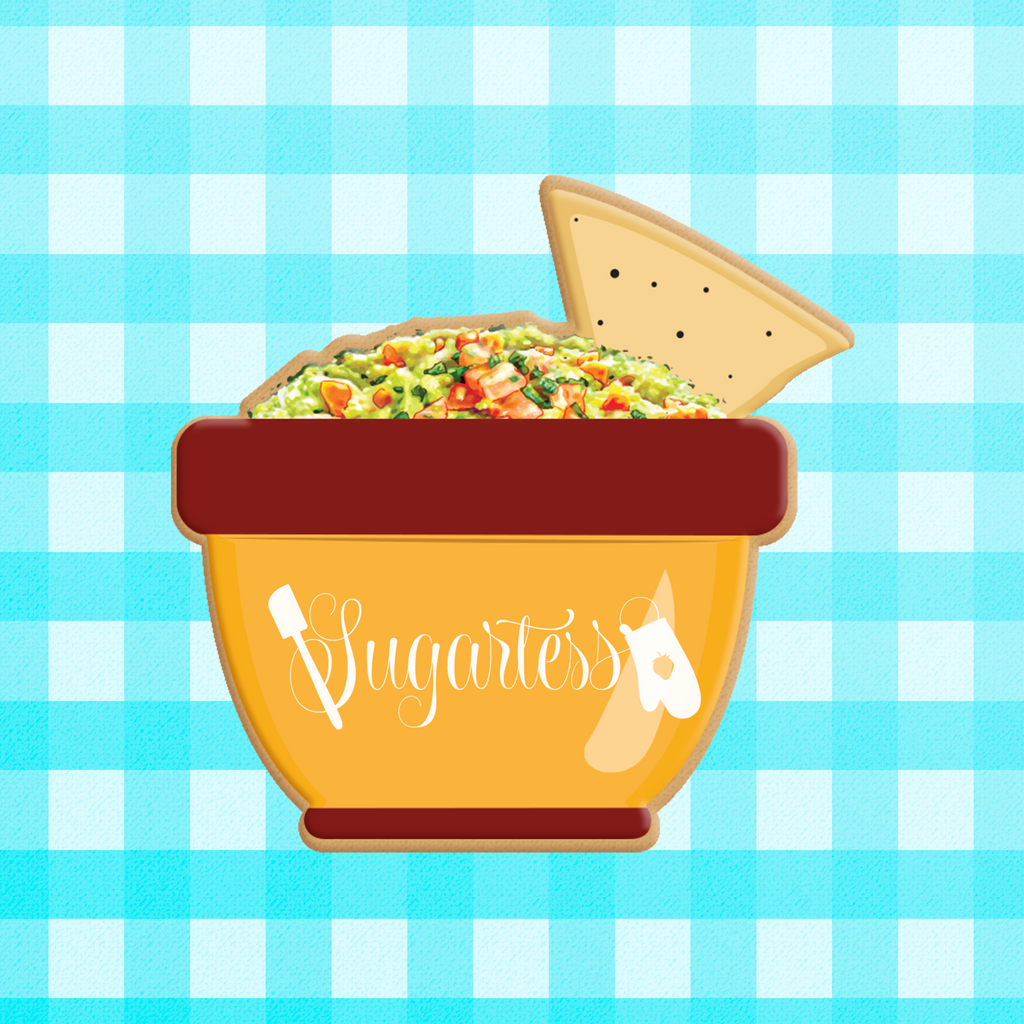 Sugartess custom cookie cutter in shape of guacamole bowl with nacho.
