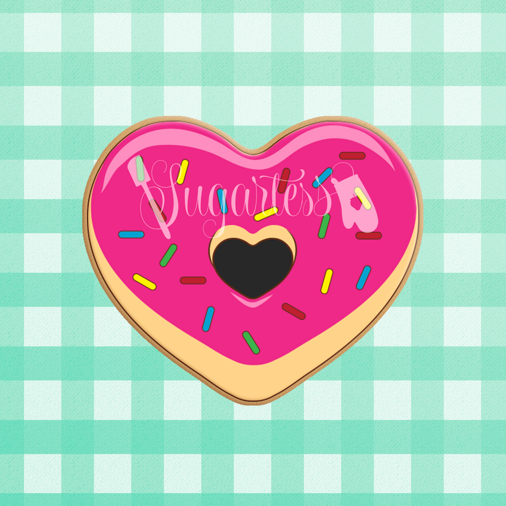 Sugartess custom cookie cutter in shape of heart-shaped donut with cut-out center.