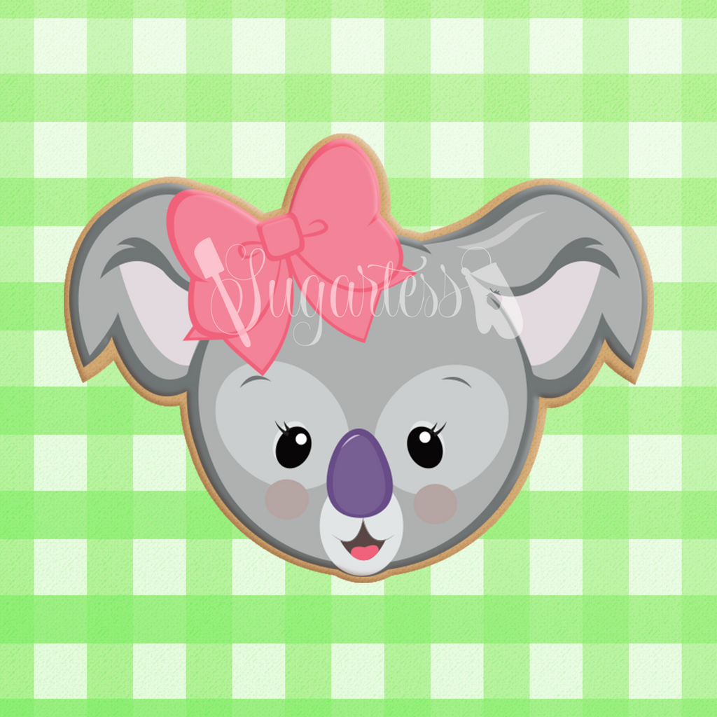 Sugartess custom cookie cutter in shape of girl koala bear head with bow.