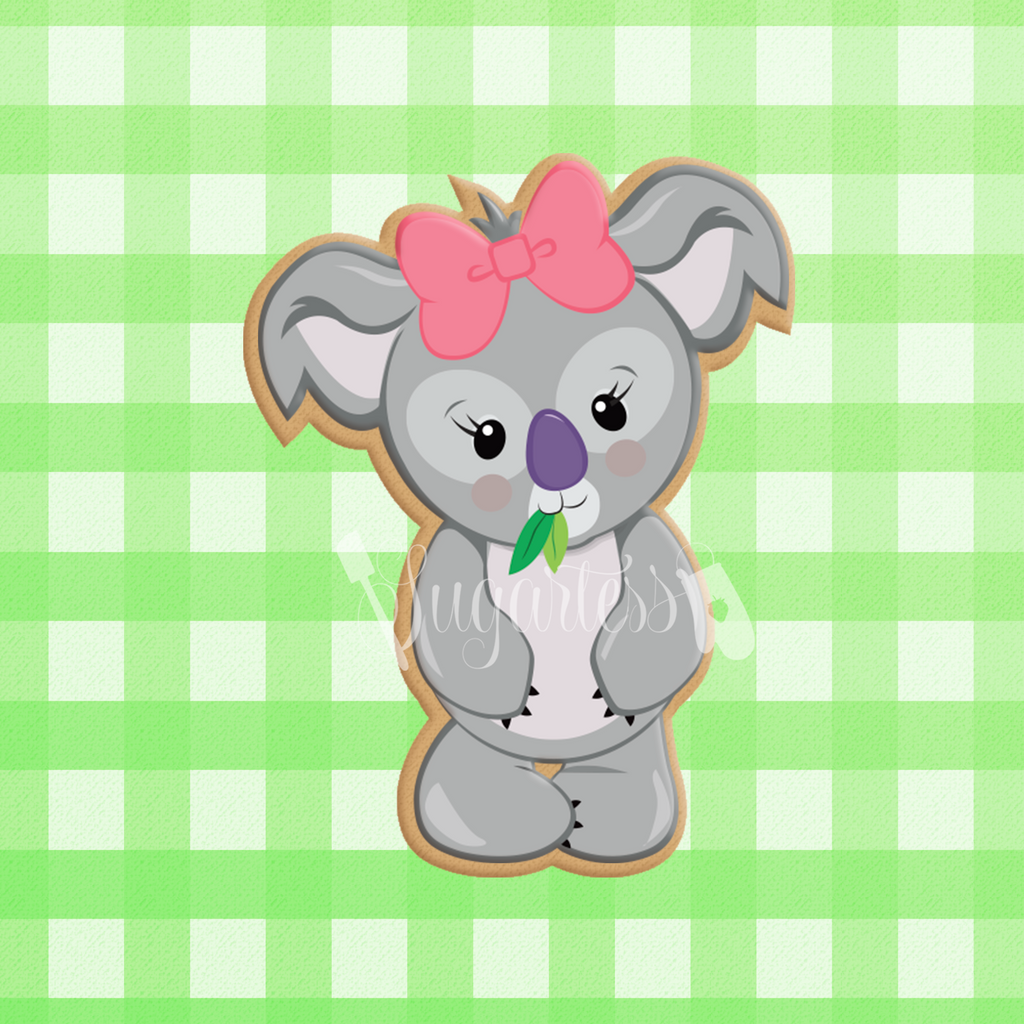 Sugartess custom cookie cutter in shape of girl koala bear standing.