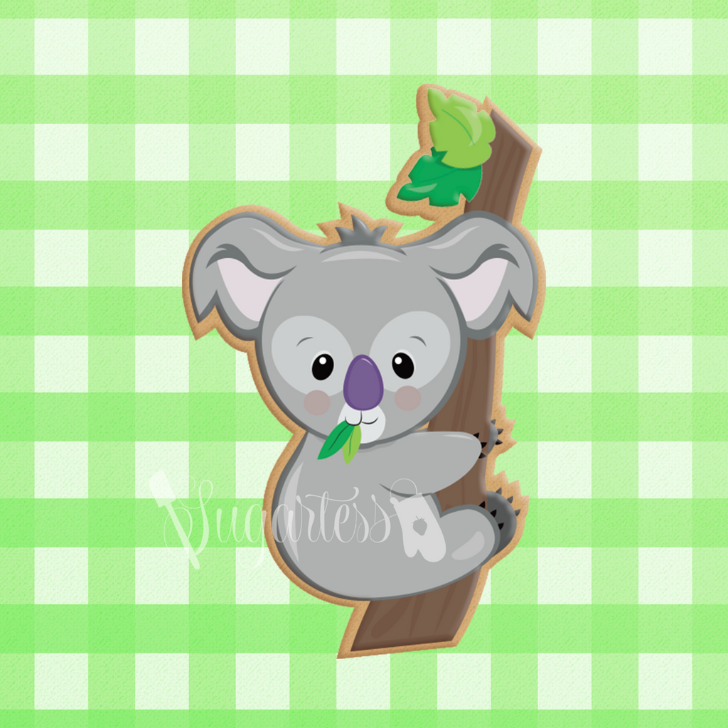 Sugartess custom cookie cutter in shape of koala bear climbed on tree.