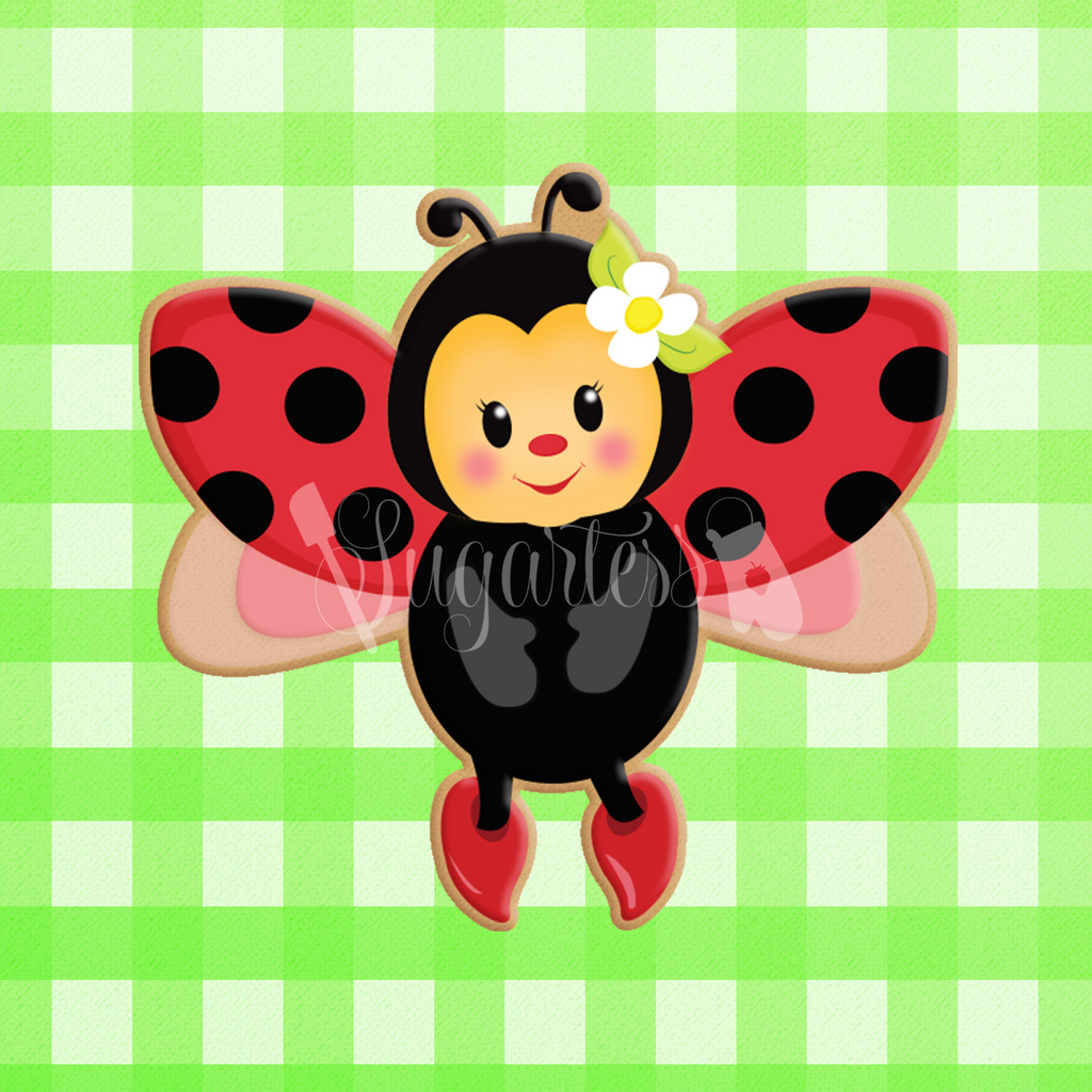 Sugartess custom cookie cutter in shape of ladybug in flight - front view.