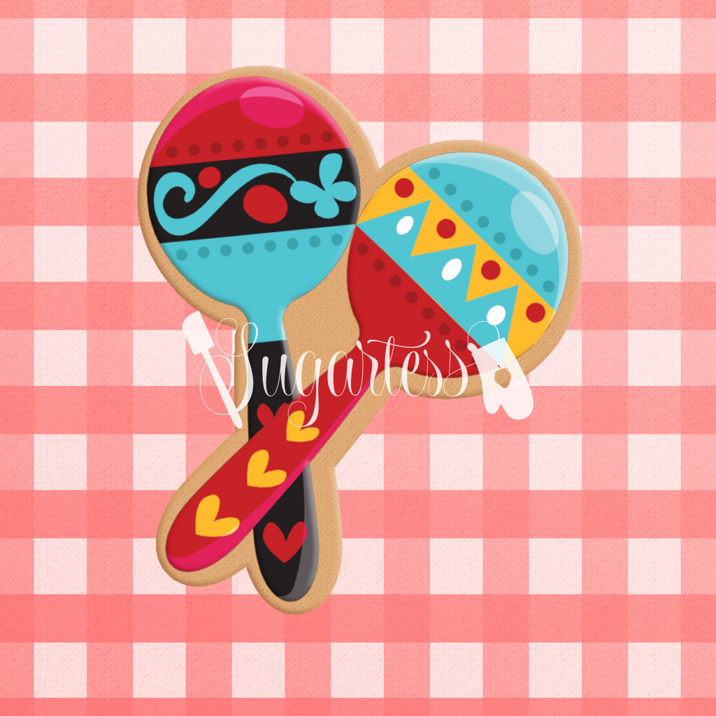 Sugartess custom cookie cutter in shape of two Mexican maracas.