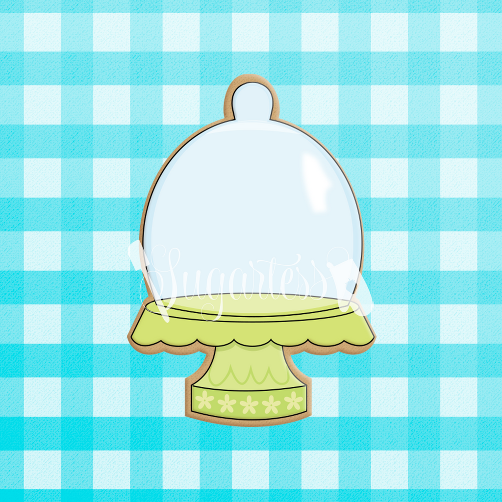 Sugartess custom cookie cutter in shape of chubby green cake stand with glass dome.