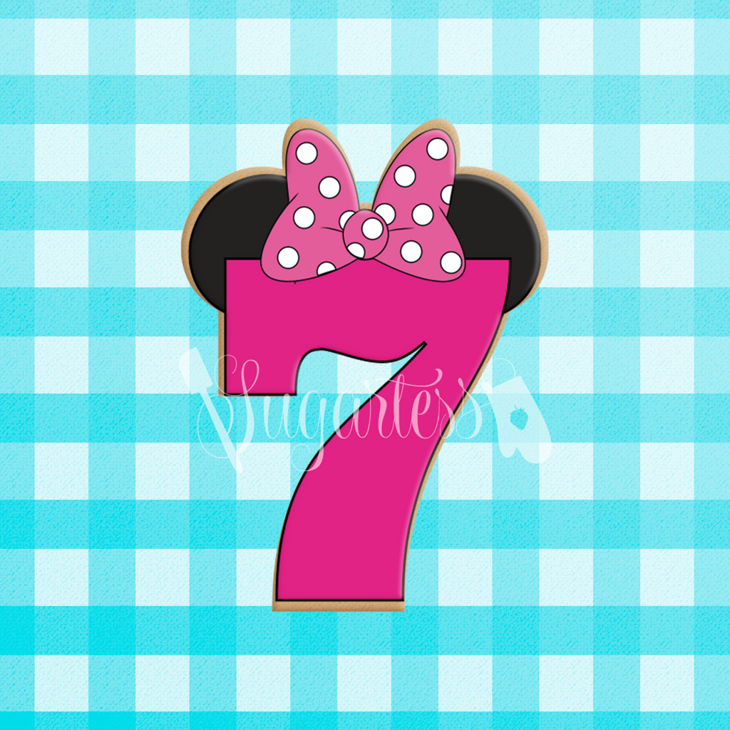 Sugartess custom cookie cutter in shape of birthday number seven with mouse ears and head bow.