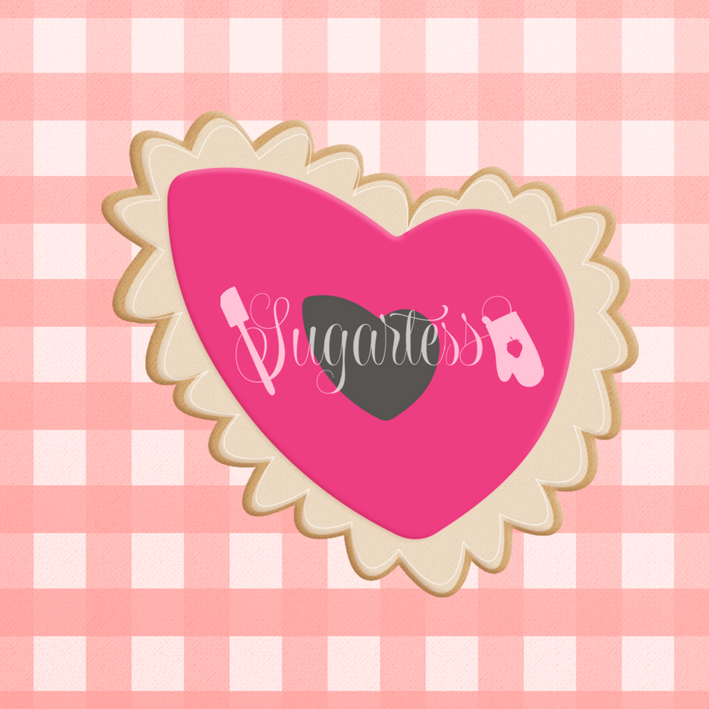 Sugartess custom cookie cutter in shape of Valentine's scalloped organic heart with cut-out center.
