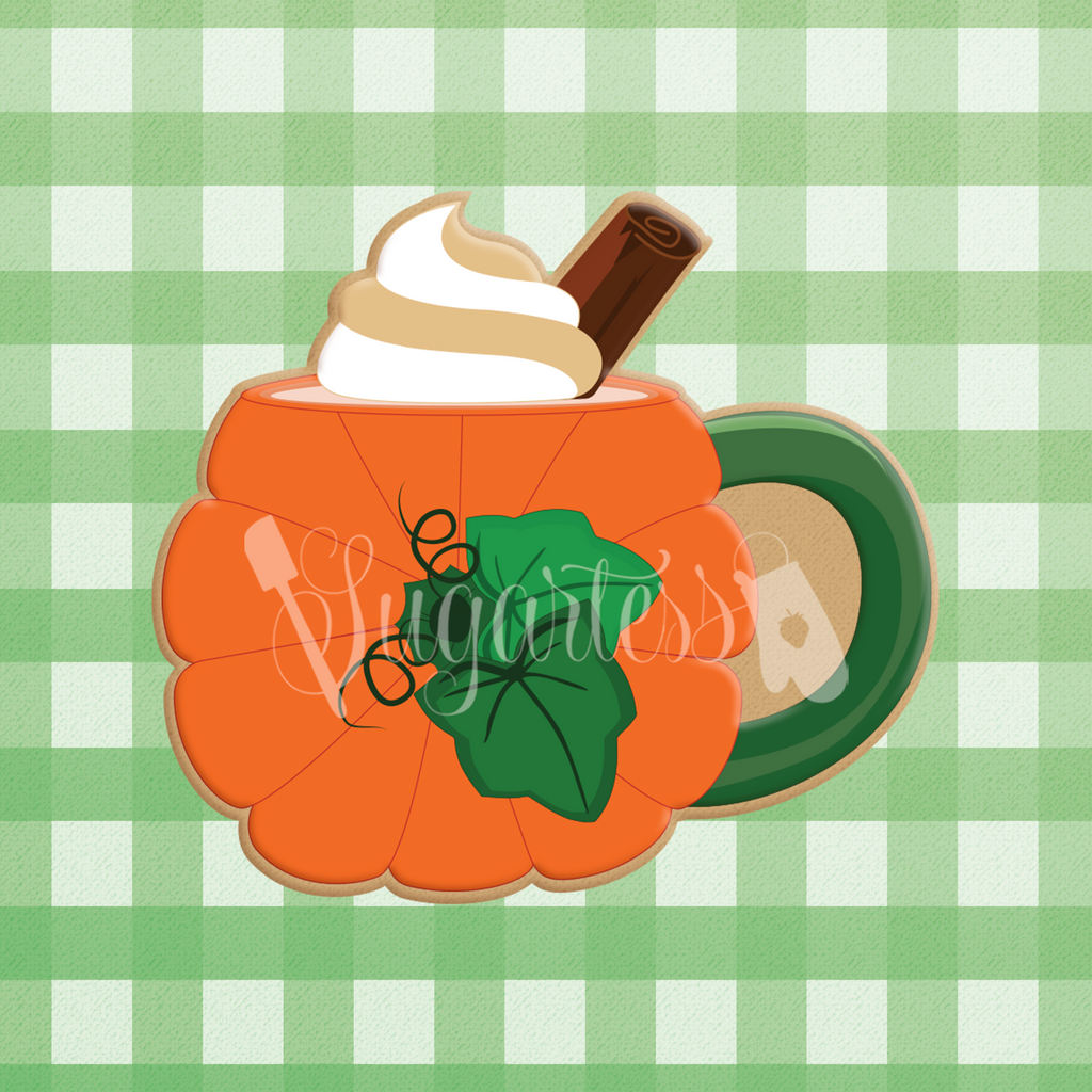 Sugartess cookie cutter in shape of a pumpkin-shaped mug or cup with cream dollop and cinnamon stick.
