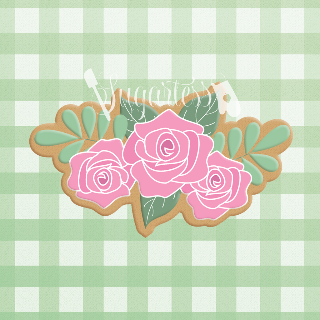 Sugartess custom cookie cutter in shape of rose trio with greens plaque.