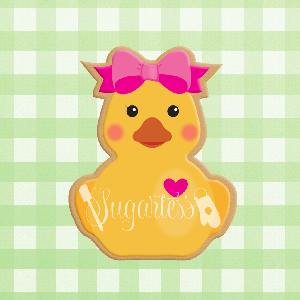 Sugartess custom cookie cutter in shape of rubber girl duck with bow.