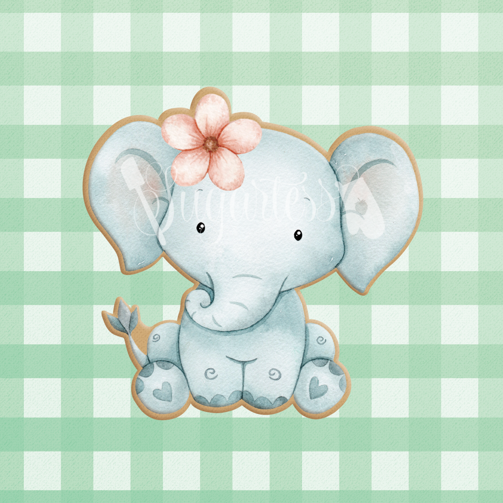 Sugartess cookie cutter in shape of sitting a sitting girl baby elephant  with flower headpiece. 