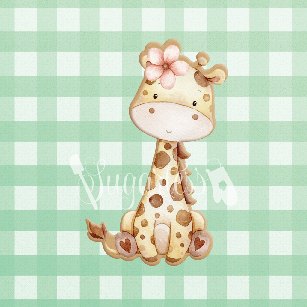 Sugartess cookie cutter in shape of a sitting baby girl giraffe with flower headpiece.