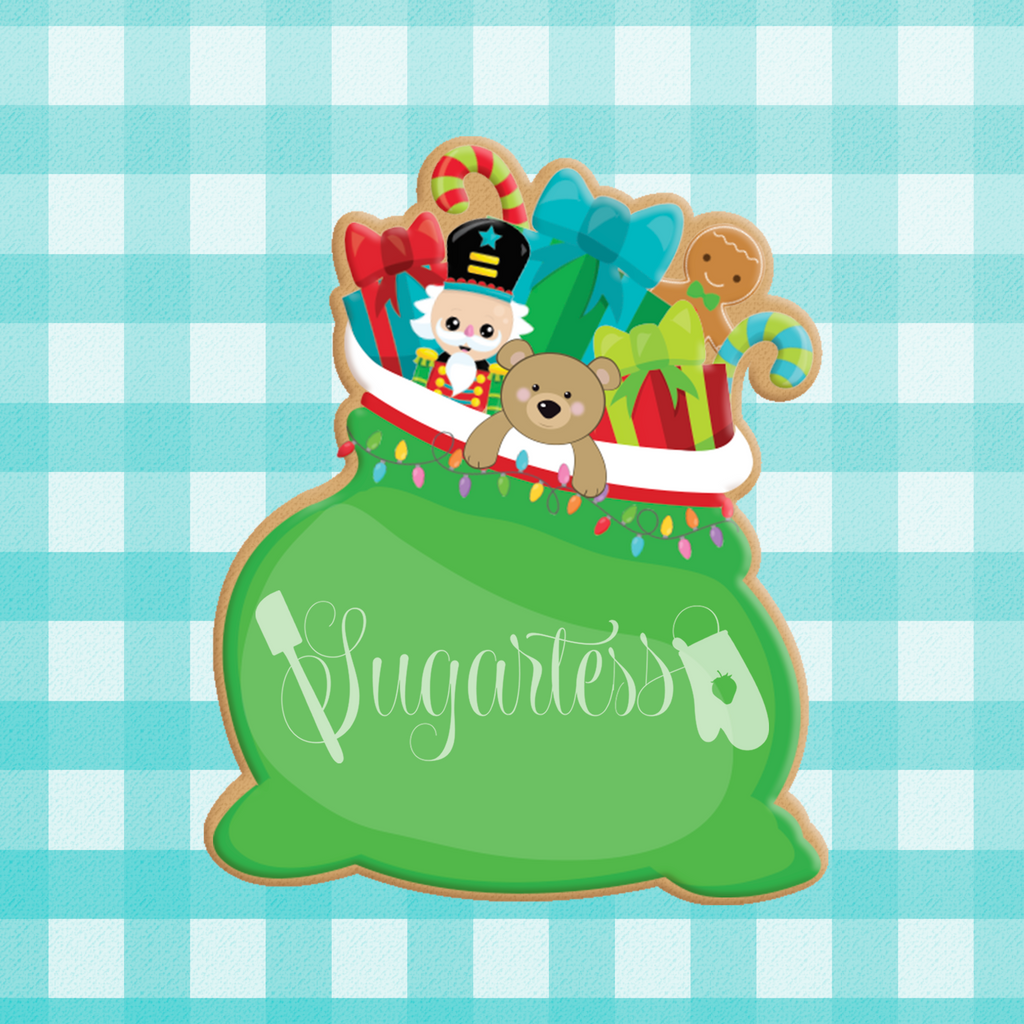 Sugartess custom cookie cutter in shape of Santa's toy bag.