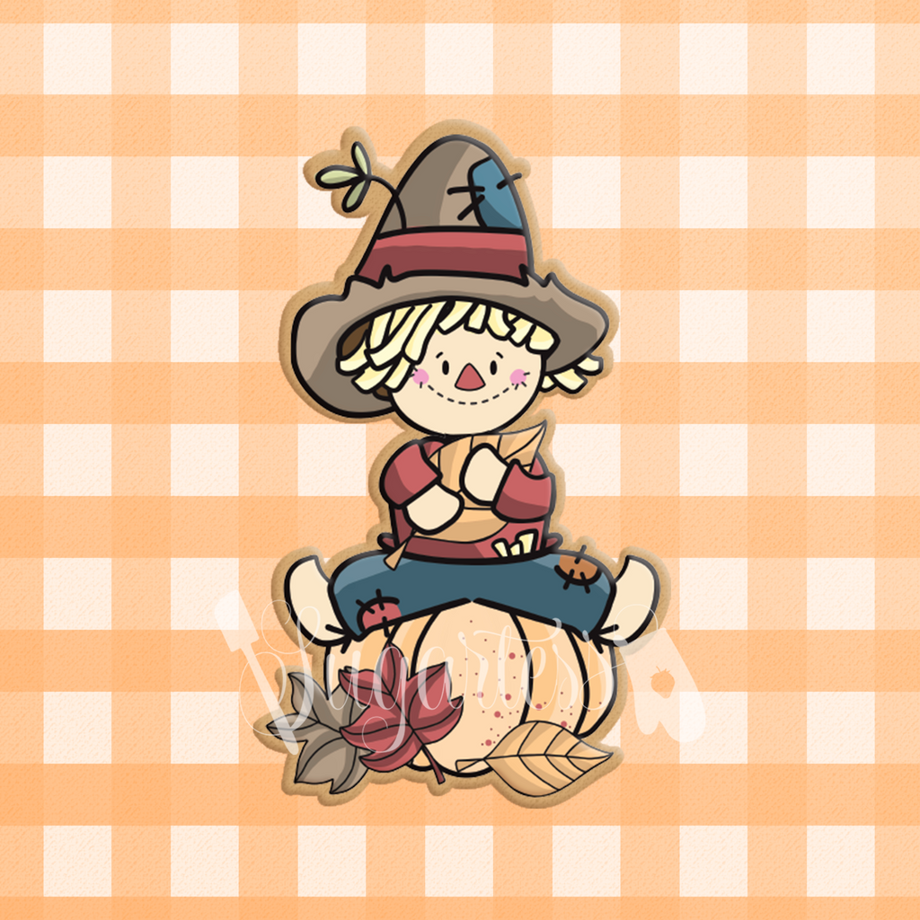 Sugartess custom cookie cutter in shape of Boy Scarecrow Farmer Sitting on Pumpkin.