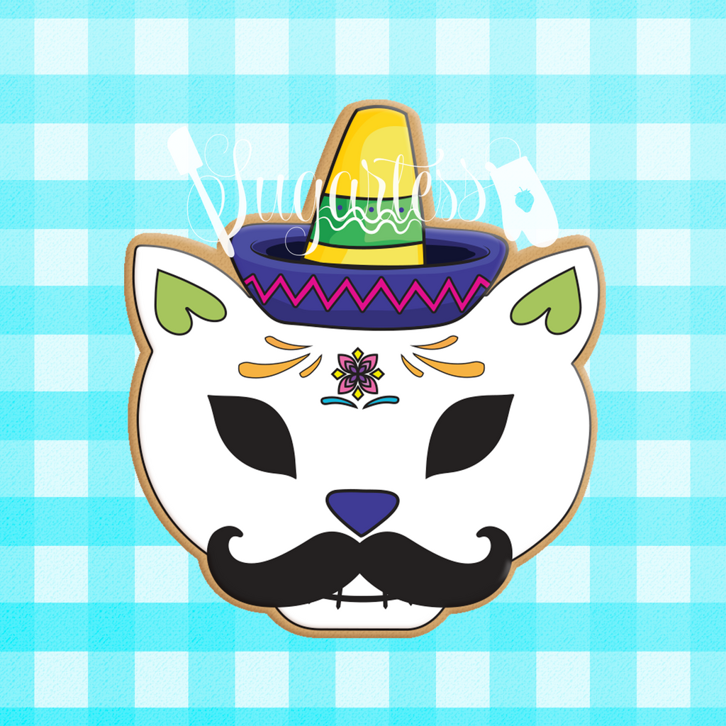 Sugartess custom cookie cutter in shape of Mexican cat skull with sombrero and mustache.