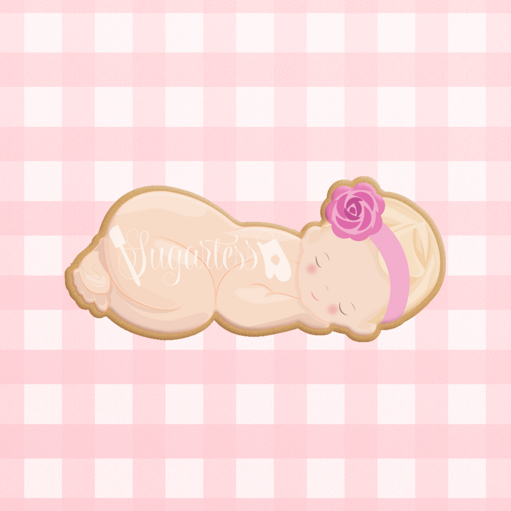 Sugartess custom cookie cutter in shape of sleeping baby girl.