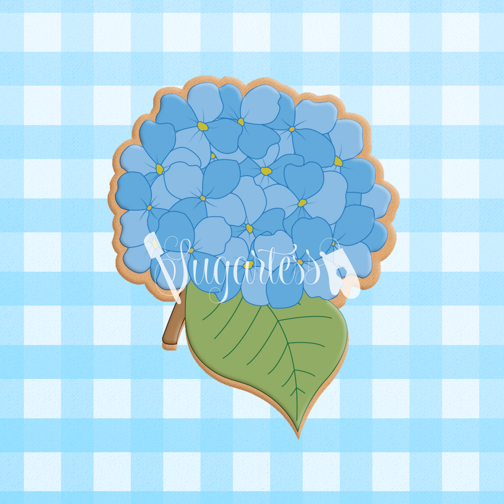 Sugartess custom cookie cutter in shape of hydrangea with leaf.
