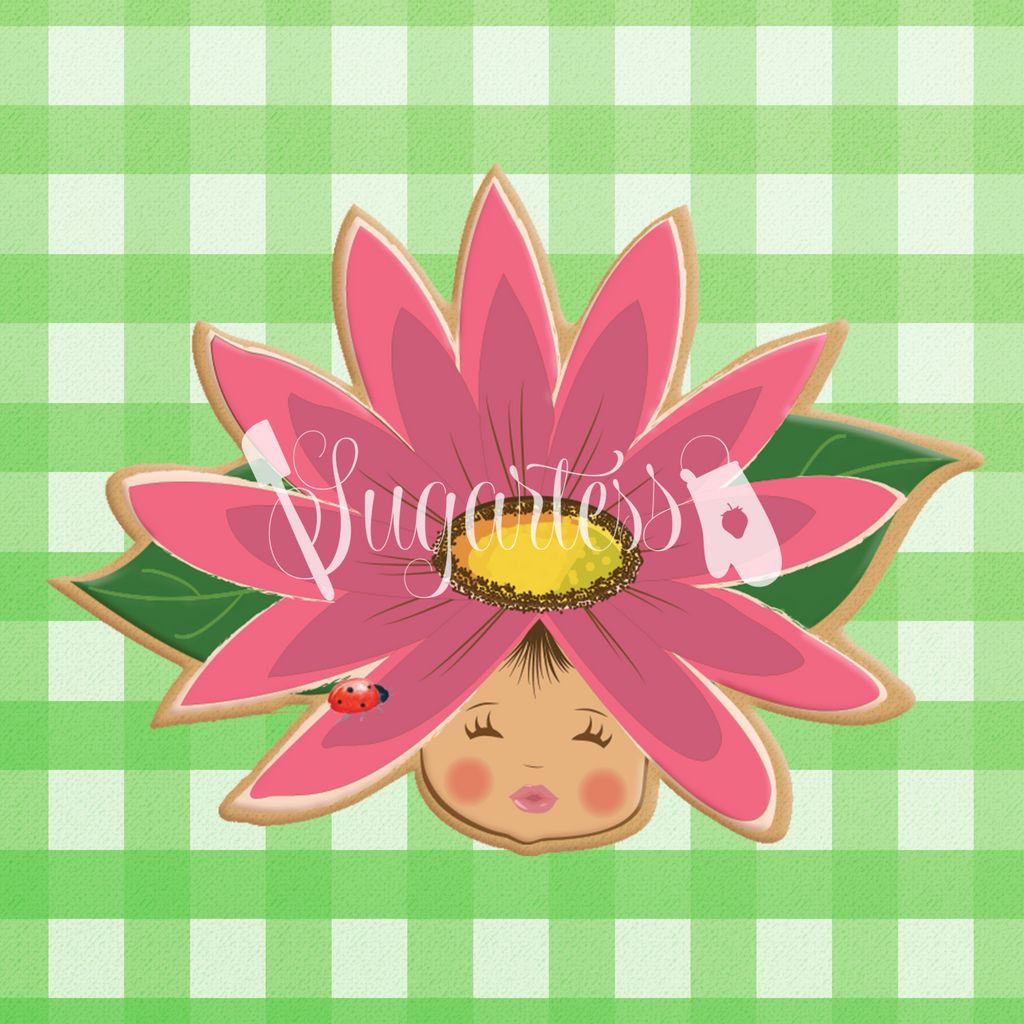 Sugartess custom cookie cutter in shape of daisy fairy head.