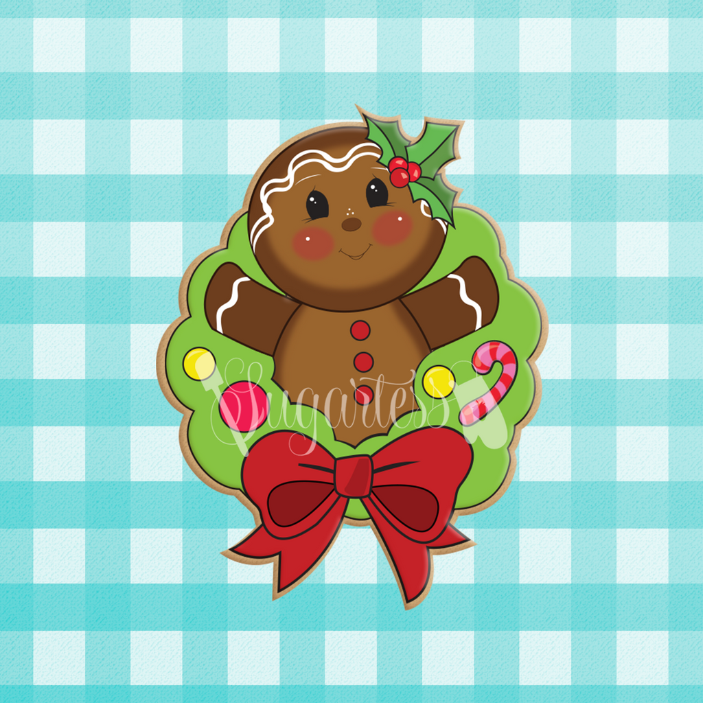 Sugartess custom holiday cookie cutter in shape of a gingerbread man popping out of a wreath.