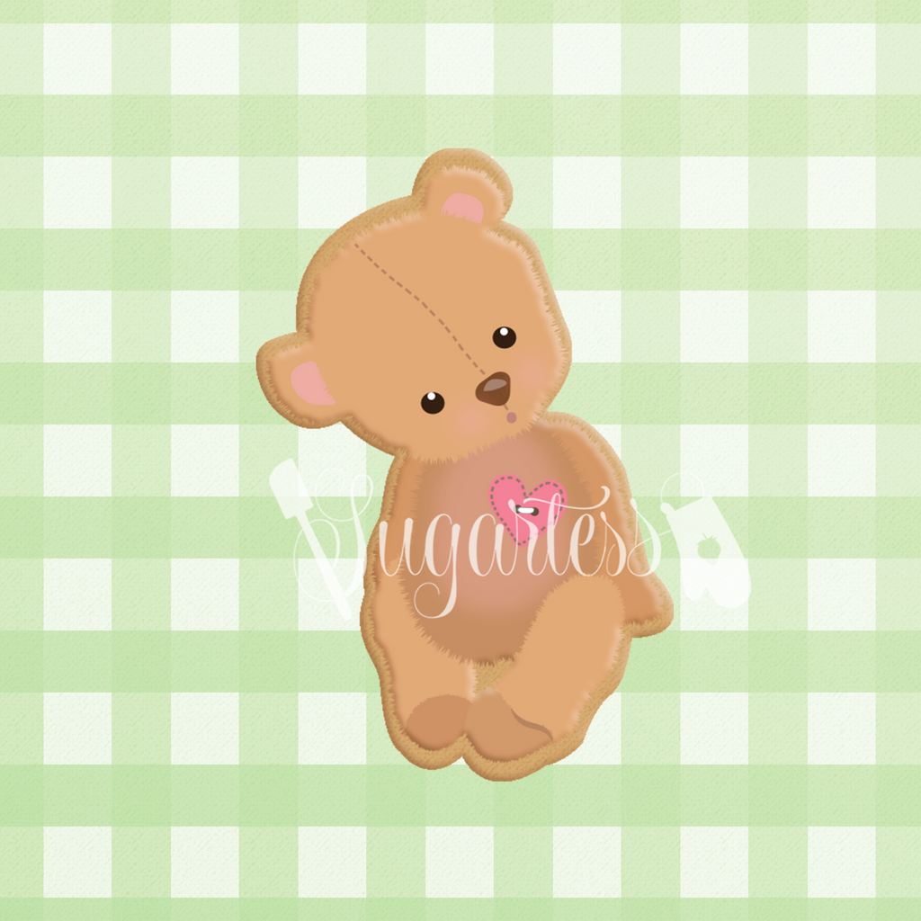Sugartess custom cookie cutter in shape of baby's sitting teddy bear.