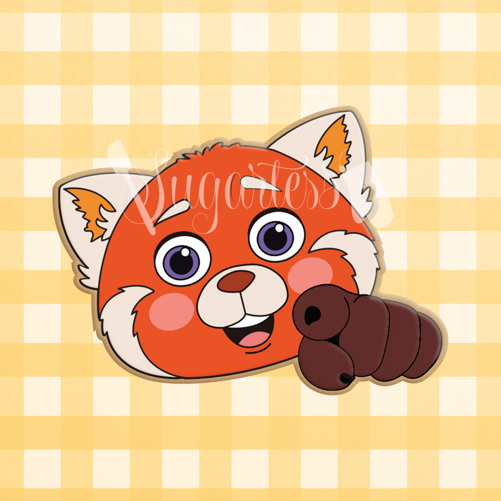 Sugartess cookie cutter in shape of red panda cartoon character head with pointing hand.